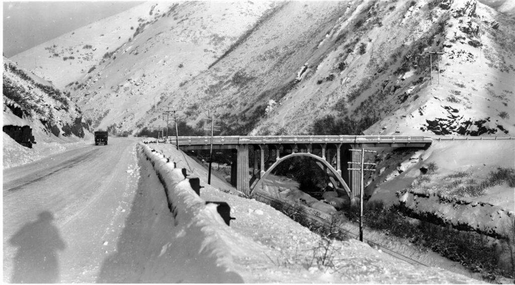 Stillman Bridge, seen here in December 1941, spanned Parley’s Creek, the canyon road, and the rail line to Park City.