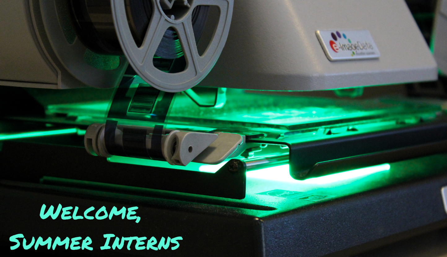 Photo of microfilm reader with the words "Welcome, Summer Interns"