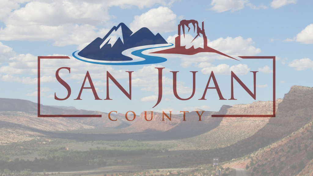Photo of a landscape in San Juan County with the San Juan County logo on top