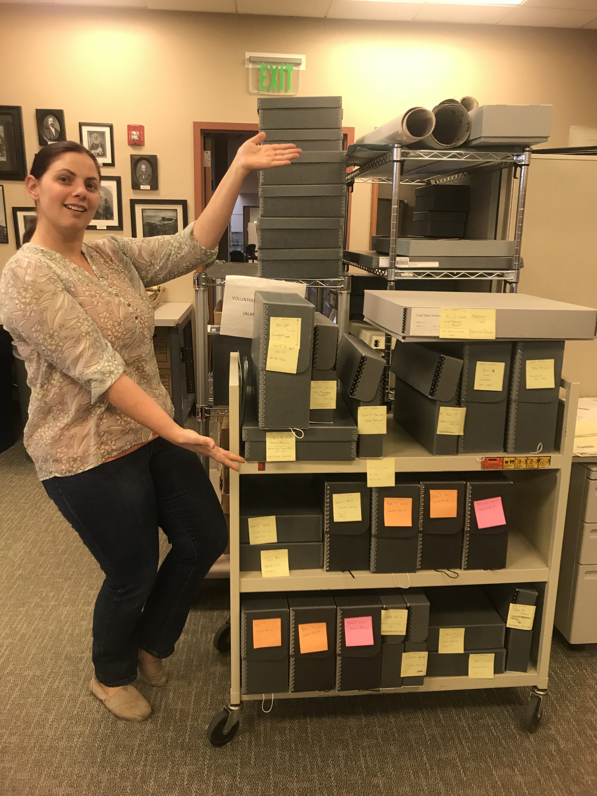 An intern with the records they accessioned