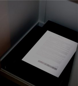 A digital document flashing across the SMA's screen.