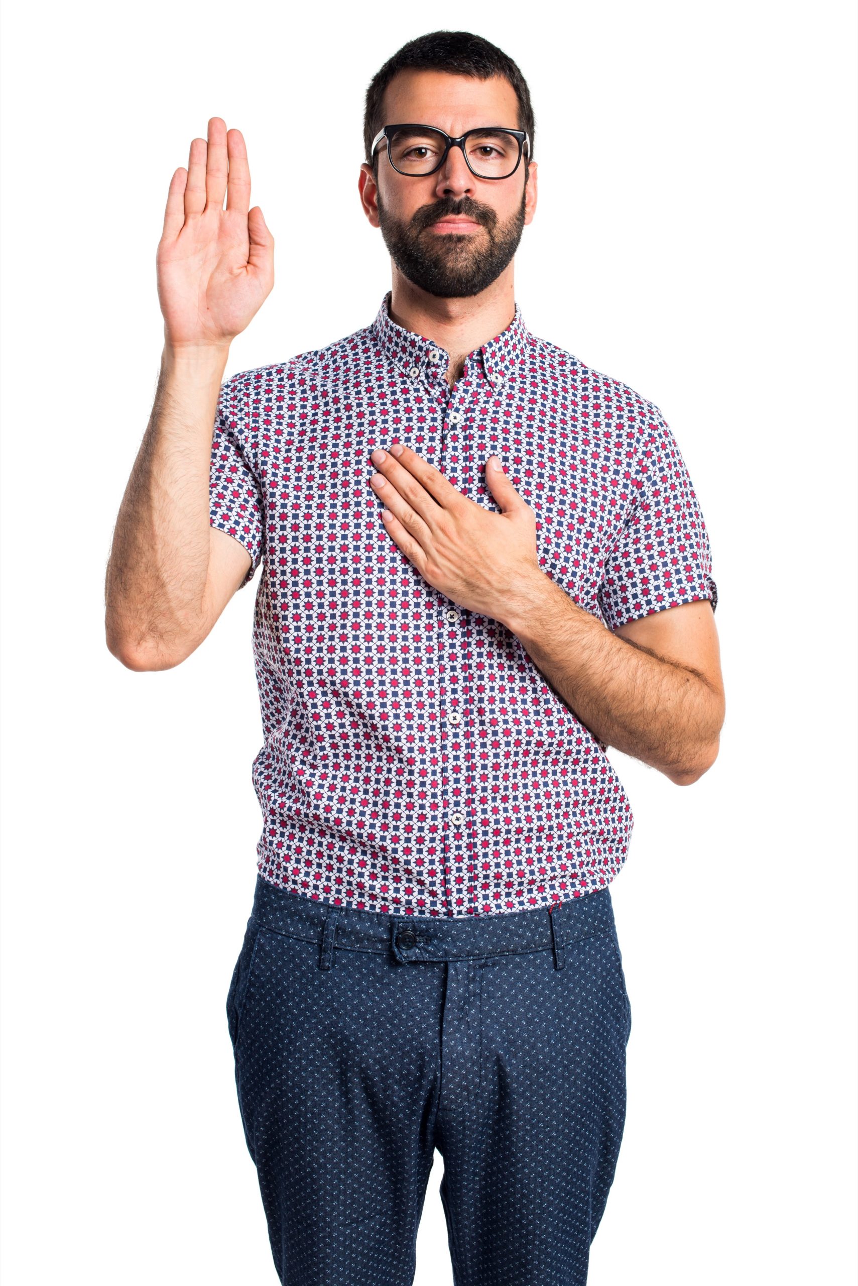 Man with glasses taking an oath